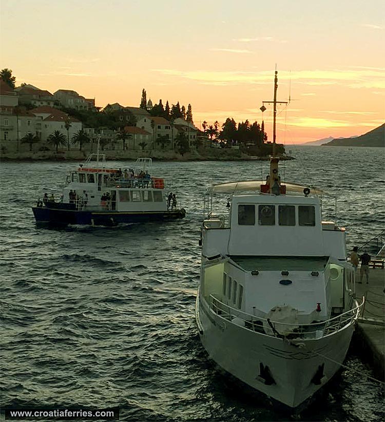 Foot passenger ferries in Adriatic sunset, summer 2016