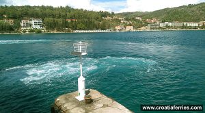 White light on top of the pier at ferry terminal @ Vela Luka, island of Korcula